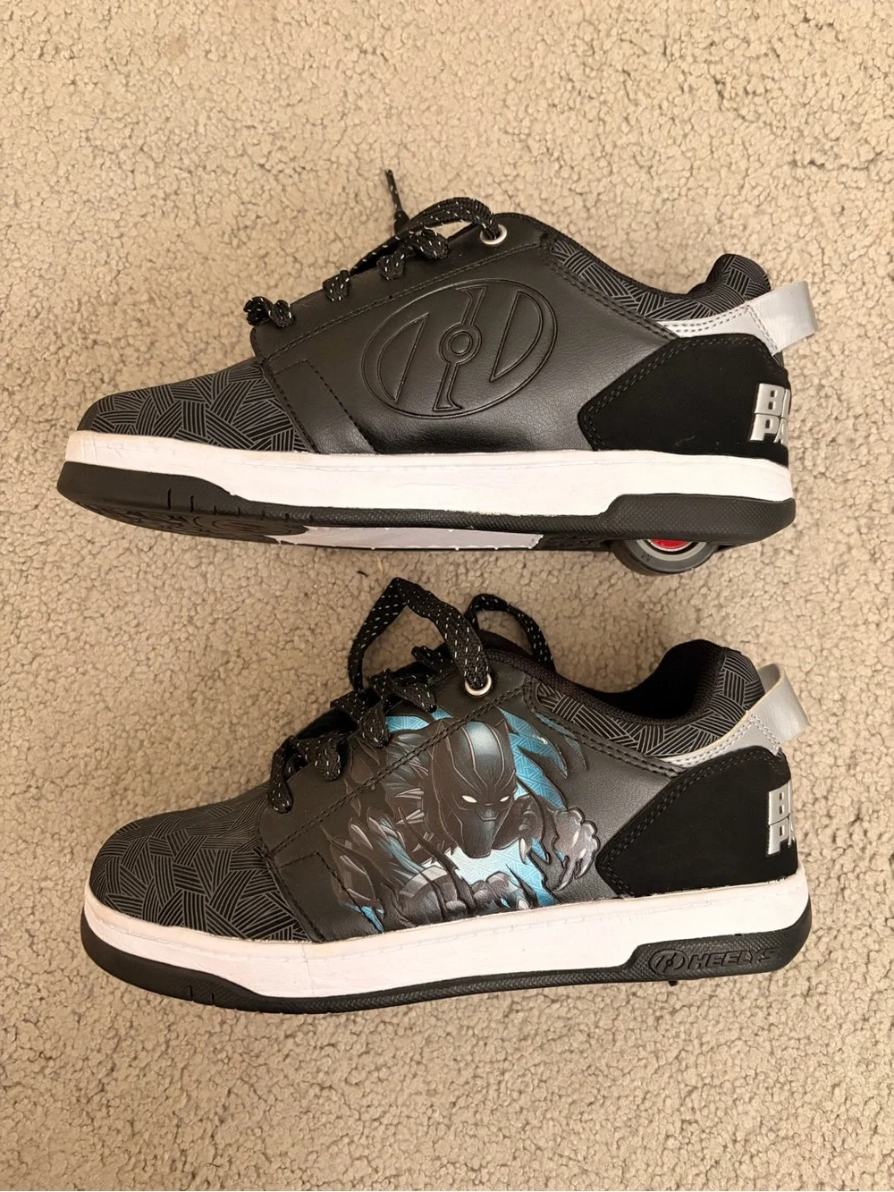 Heelys Black and White Kids' Sneakers with Subtle Blue Accent